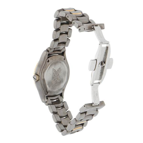 Reloj Ebel para dama en acero inoxidable vistas en oro.