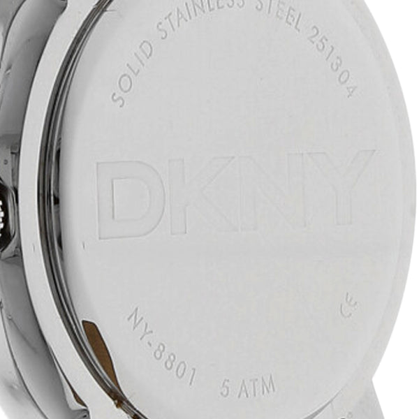 Reloj DKNY para dama en acero inoxidable correa piel.
