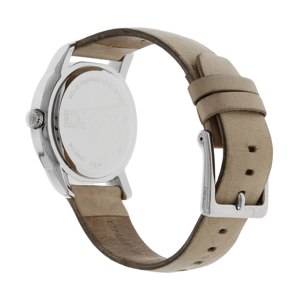 Reloj DKNY para dama en acero inoxidable correa piel.