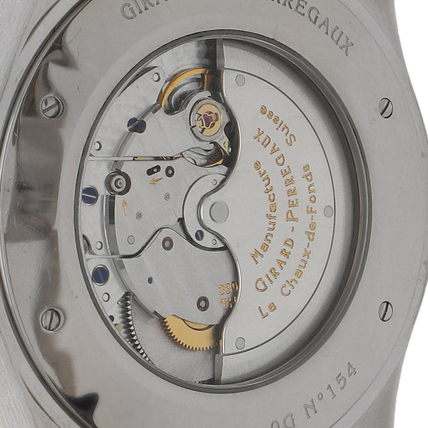 Reloj Girard Perregaux para caballero modelo 1966 caja y broche en oro blanco 18 kilates.