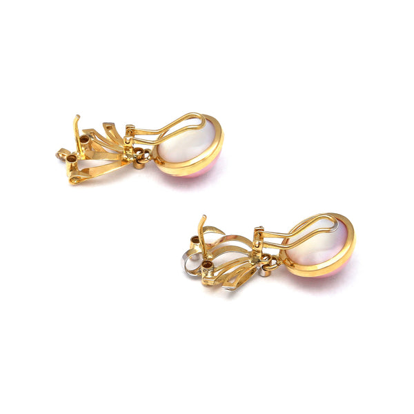 Juego de anillo y aretes diseño especial con circonias y medias perlas rosas en oro amarillo 14 kilates.