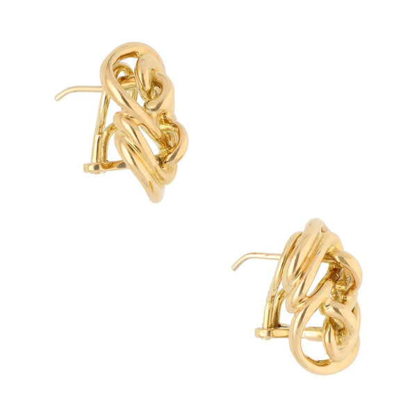 Aretes calados firma Tane en oro amarillo 18 kilates.