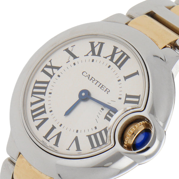 Reloj Cartier para dama modelo Ballon Blue en acero vistas oro amarillo 18 kilates.