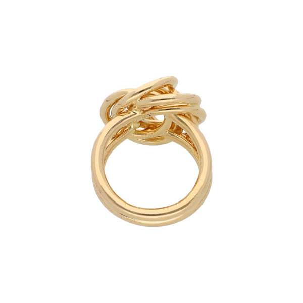 Anillo estilizado calado firma Tane en oro amarillo 18 kilates.