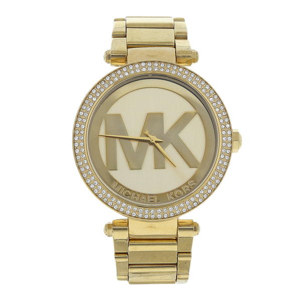 Reloj Michael Kors para dama en acero chapa.