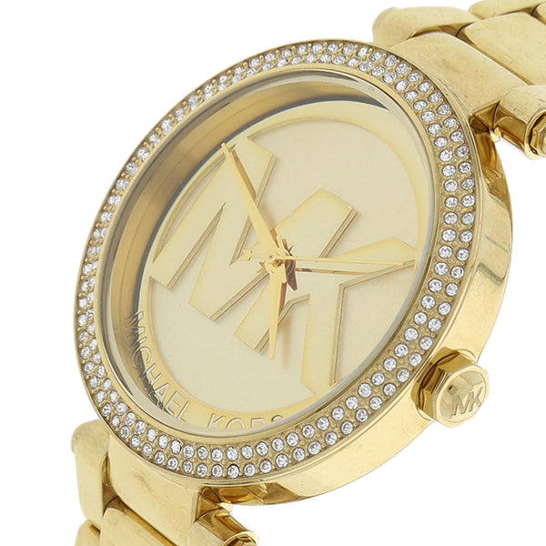 Reloj Michael Kors para dama en acero chapa.