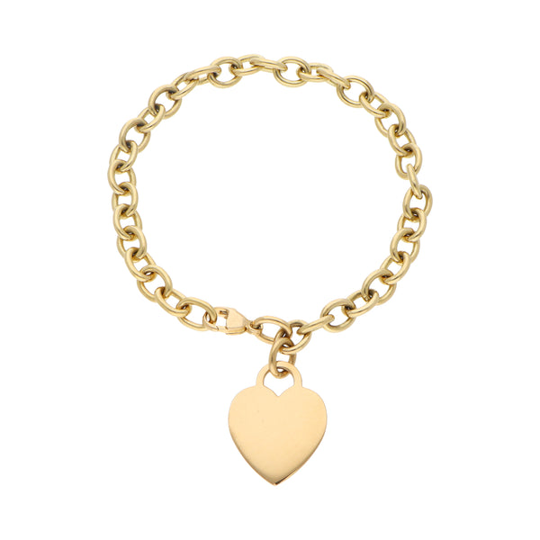 Pulsera eslabón cruzado con dije motivo corazón firma Tiffany & Co. en oro amarillo 18 kilates.