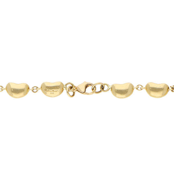 Pulsera eslabón combinado firma Tiffany & Co. en oro amarillo 18 kilates.