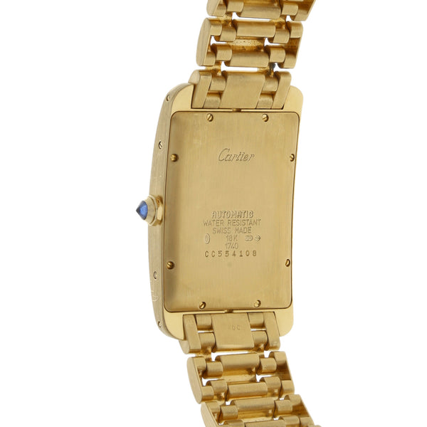 Reloj Cartier para caballero modelo Tank Americano en oro amarillo 18 kilates.