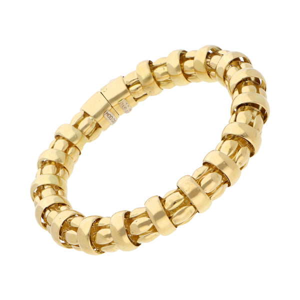 Pulsera eslabón combinado en oro amarillo 18 kilates.