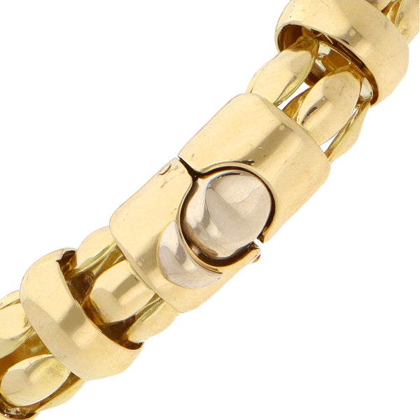 Pulsera eslabón combinado en oro amarillo 18 kilates.