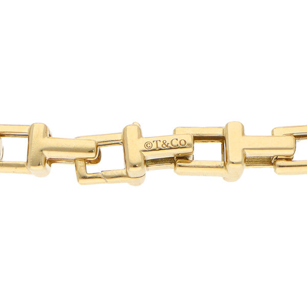 Pulsera eslabón encontrado articulado firma Tiffany & Co. en oro amarillo 18 kilates.