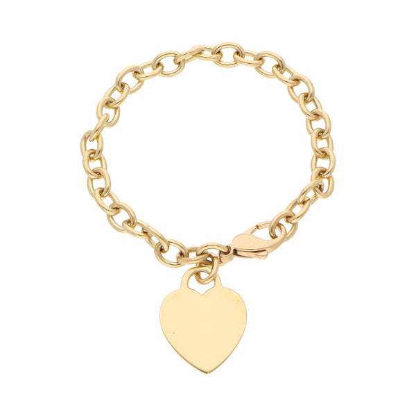 Pulsera eslabón combinado con dije motivo corazón firma Tiffany & Co. en oro amarillo 18 kilates.