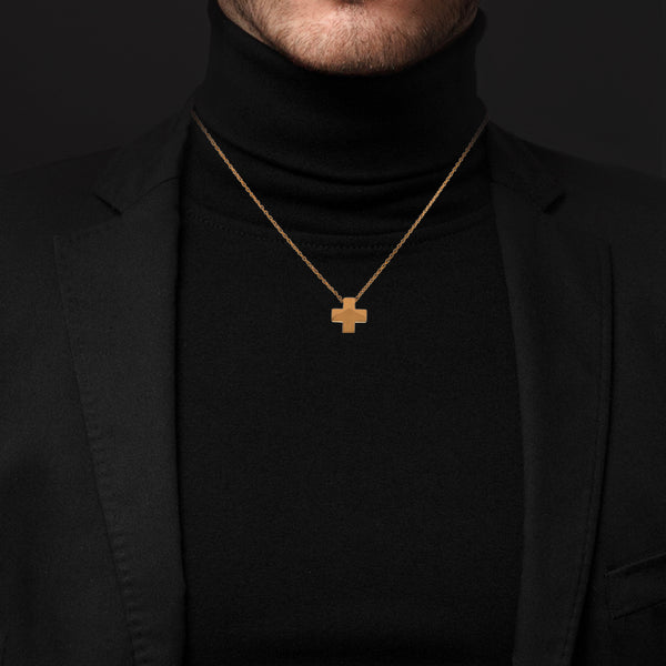 Collar eslabón encontrado con cruz lisa firma Tane en oro amarillo 18 kilates.