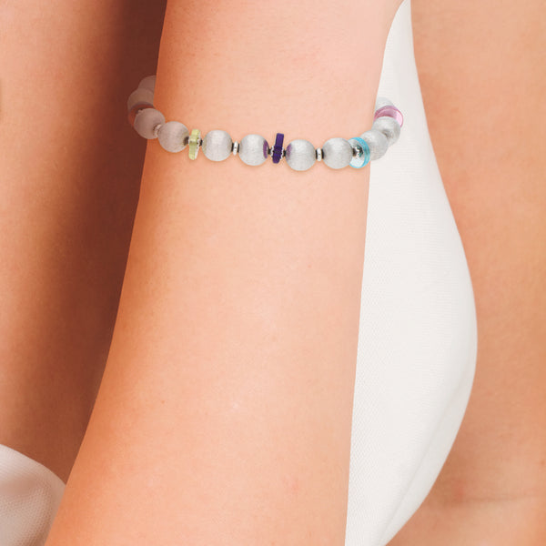 Pulsera eslabón combinado con sintéticos en oro blanco 14 kilates.