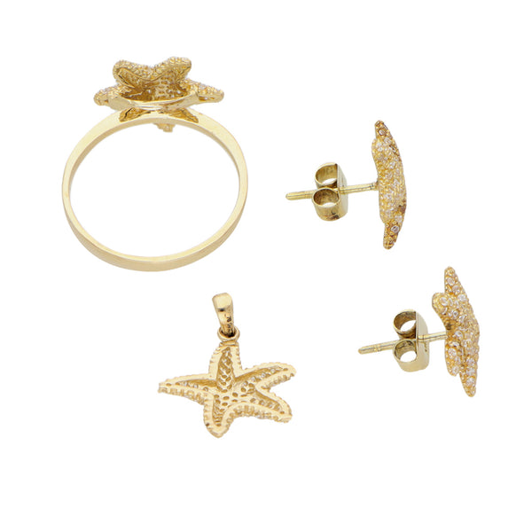 Juego de anillo, broqueles y dije diseño especial motivo estrella de mar con circonias en oro amarillo 14 kilates.