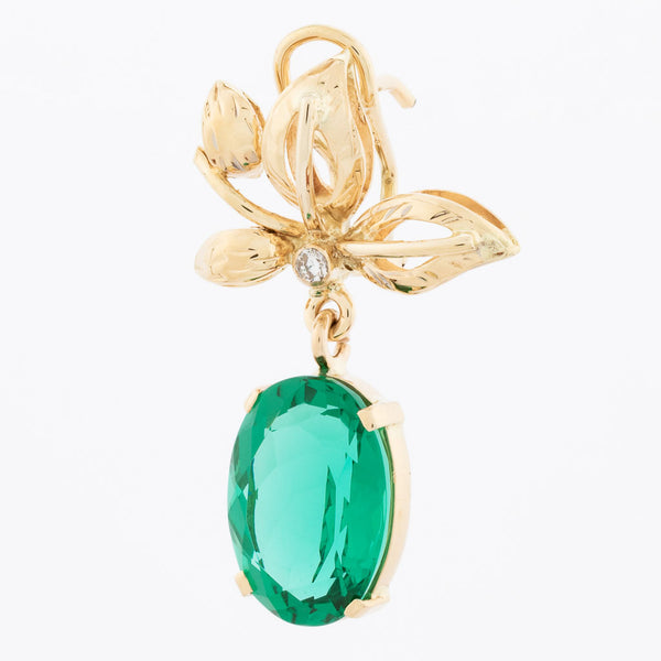 Aretes articulados motivo hojas con obsidianas verdes y circonias en oro amarillo 14 kilates.