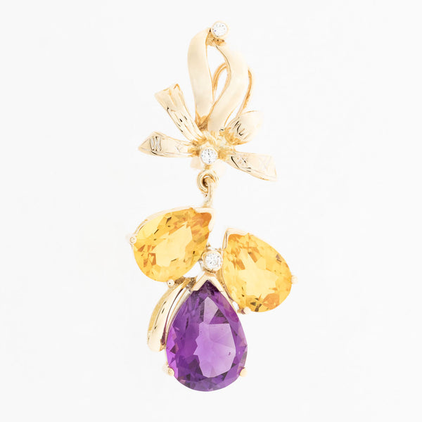 Aretes estilizados con amatista, citrinos y circonias en oro amarillo 14 kilates.
