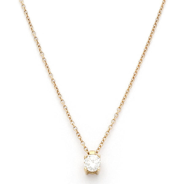 Juego de gargantilla eslabón cruzado con colgante y aretes diseño especial con diamantes en oro amarillo 14 kilates.