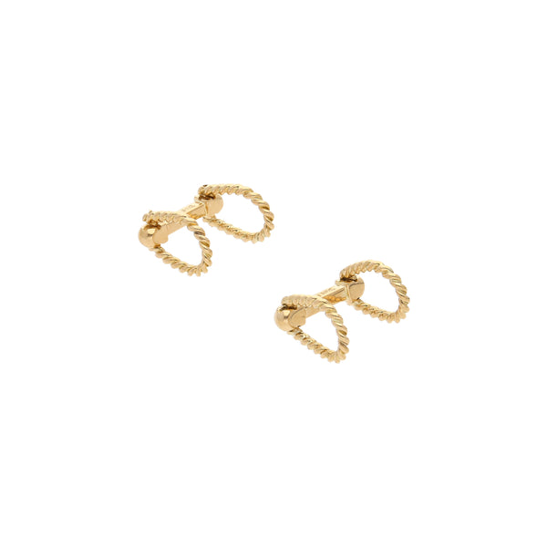 Mancuernillas diseño especial firma Tane en oro amarillo 18 kilates.