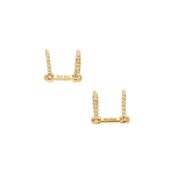 Mancuernillas diseño especial firma Tane en oro amarillo 18 kilates.