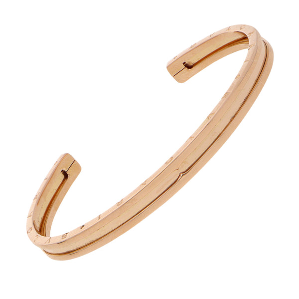Pulsera abierta rigida firma Bulgari en oro rosa 18 kilates.