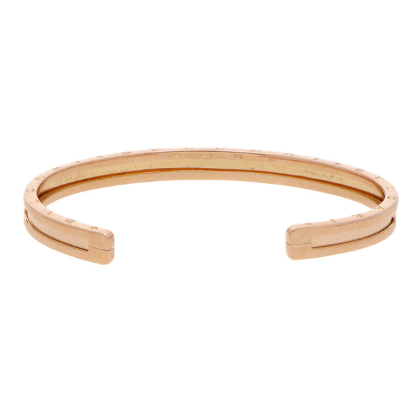 Pulsera abierta rigida firma Bulgari en oro rosa 18 kilates.