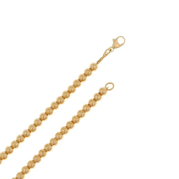 Gargantilla eslabón boleado con colgante motivo corazón firma Tiffany & Co. en oro amarillo 18 kilates.
