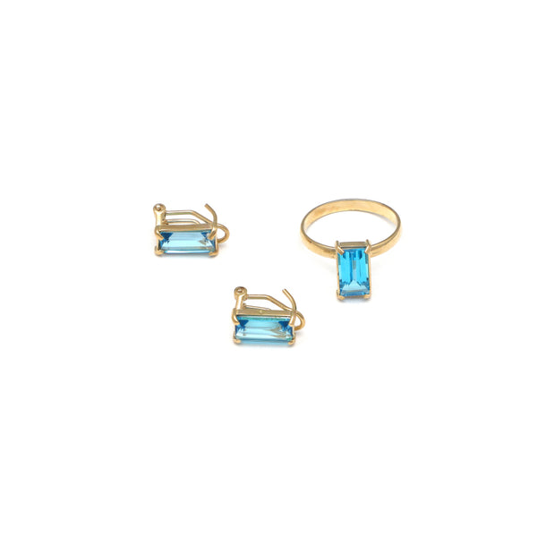 Juego de anillo y aretes lisos con topacios London blue en oro amarillo 14 kilates.