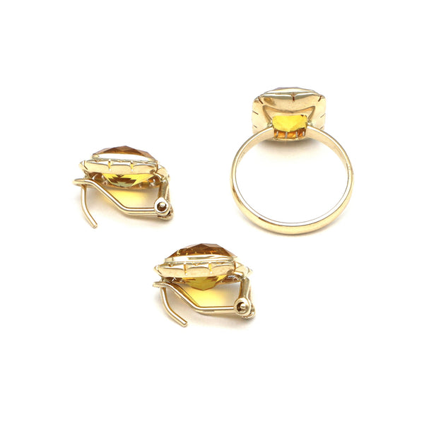 Juego de anillo y aretes diseño especial con citrinos en oro amarillo 14 kilates.