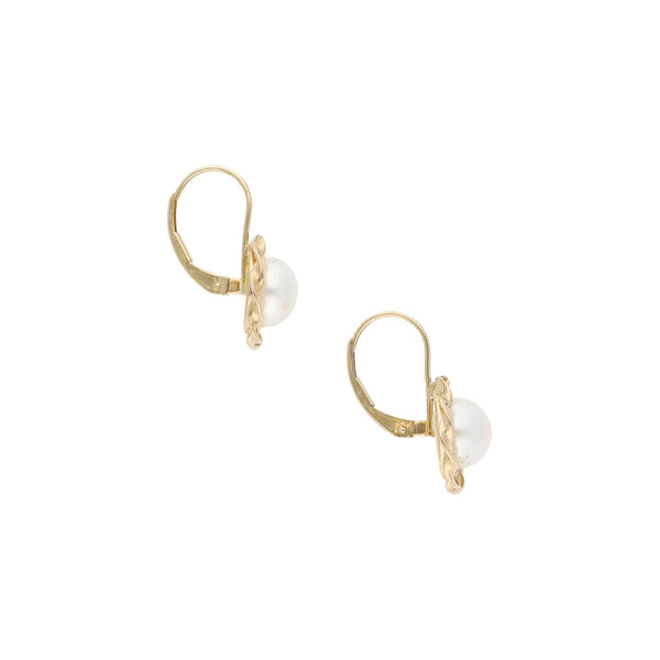 Aretes diseño especial con perlas en oro amarillo 14 kilates.