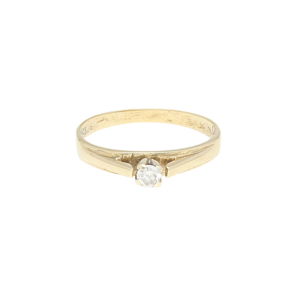 Anillo solitario con diamante en oro amarillo 14 kilates.