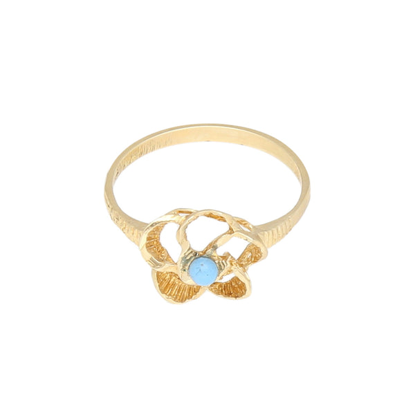 Anillo calado motivo flor en oro amarillo 14 kilates.