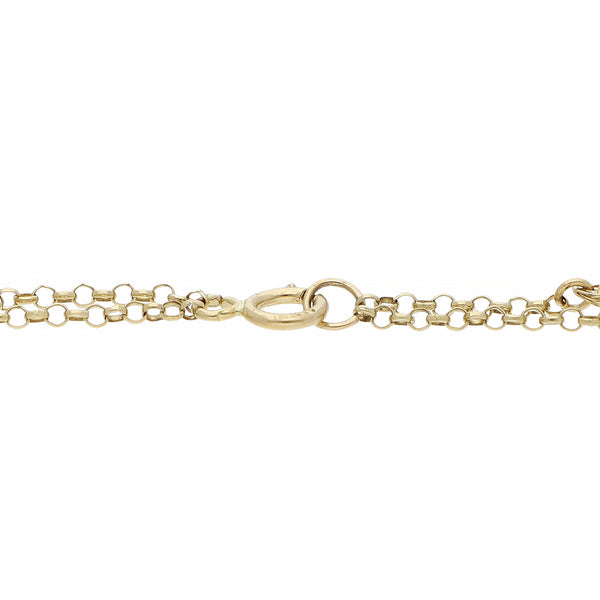 Pulsera eslabón cruzado con aplicaciones motivo ojos y sintéticos en oro amarillo 14 kilates.