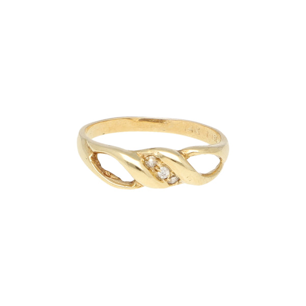 Anillo calado con circonias en oro amarillo 14 kilates.