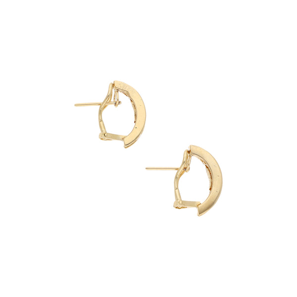 Aretes estilizados con diamantes en oro amarillo 14 kilates.