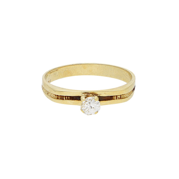 Anillo solitario con diamante en oro amarillo 14 kilates.