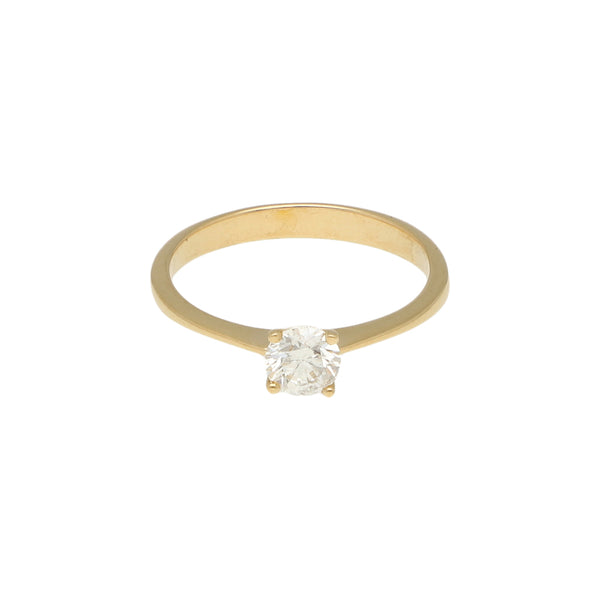 Anillo solitario con diamante en oro amarillo 18 kilates.