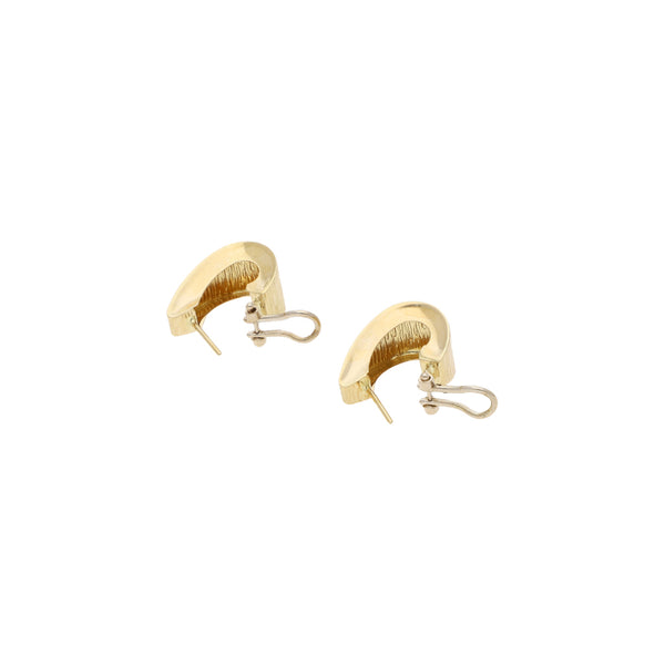 Juego de anillo y aretes estriados en oro amarillo 14 kilates.