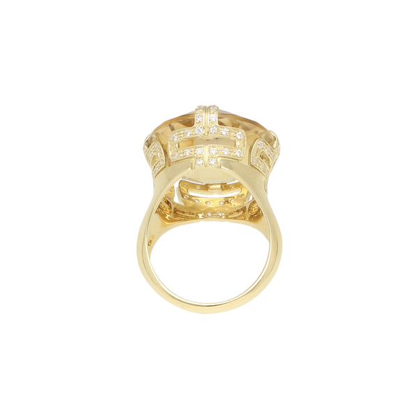 Anillo estilizado con sintéticos en oro amarillo 14 kilates.