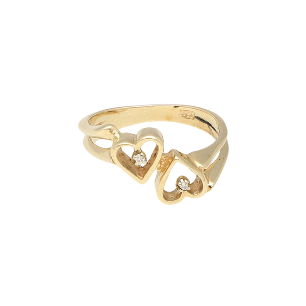 Anillo calado motivo corazones con diamantes en oro amarillo 14 kilates.