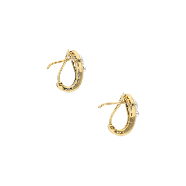 Aretes calados con diamantes en oro dos tonos 18 kilates.