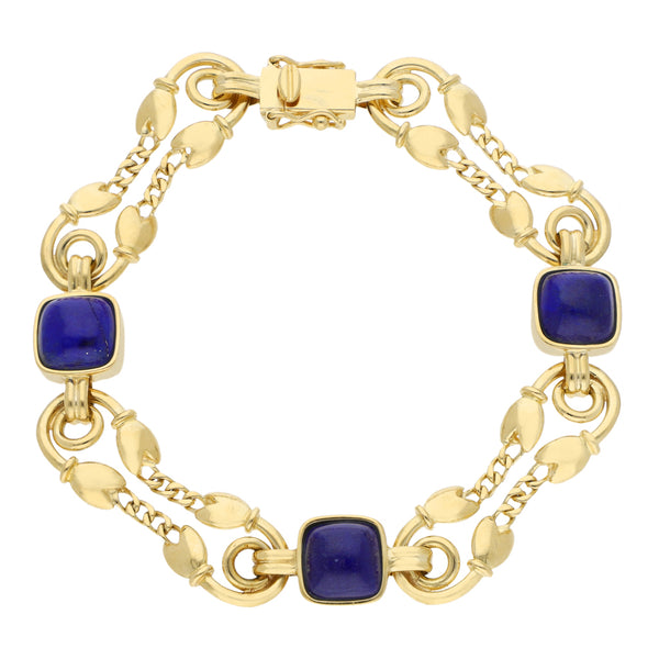 Pulsera eslabón combinado con lapislazuli en oro amarillo 18 kilates.