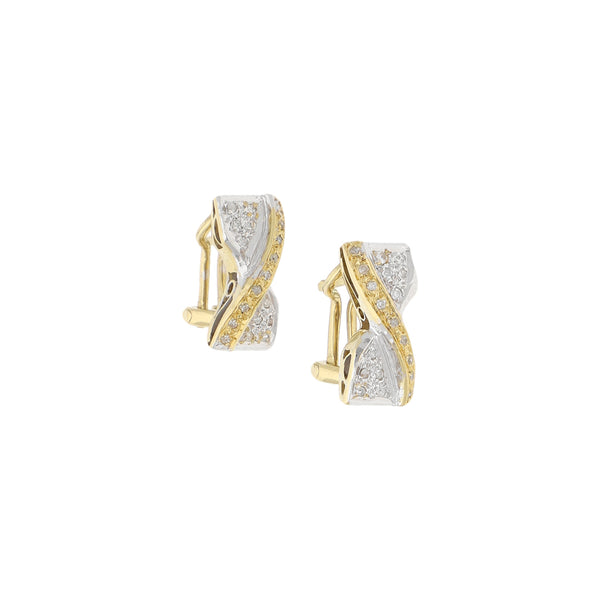 Aretes diseño especial con diamantes en oro amarillo 14 kilates.