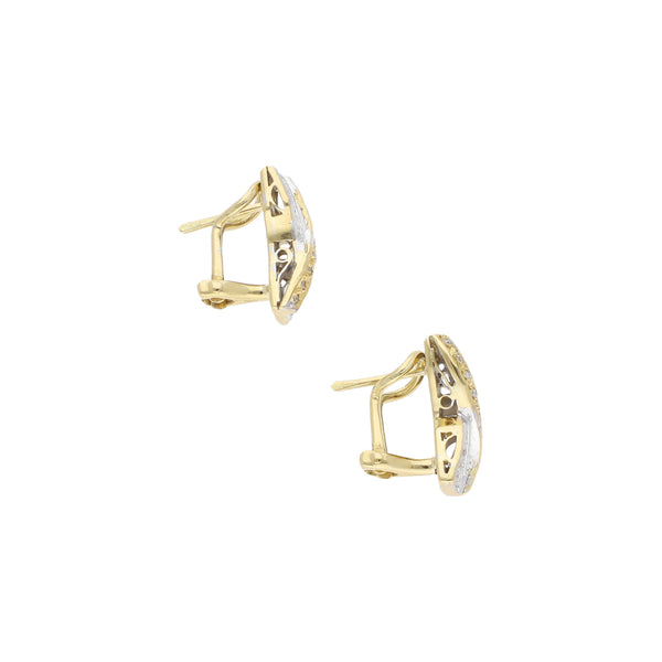 Aretes diseño especial con diamantes en oro amarillo 14 kilates.