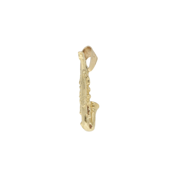 Dije diseño especial motivo saxofón en oro amarillo 14 kilates.