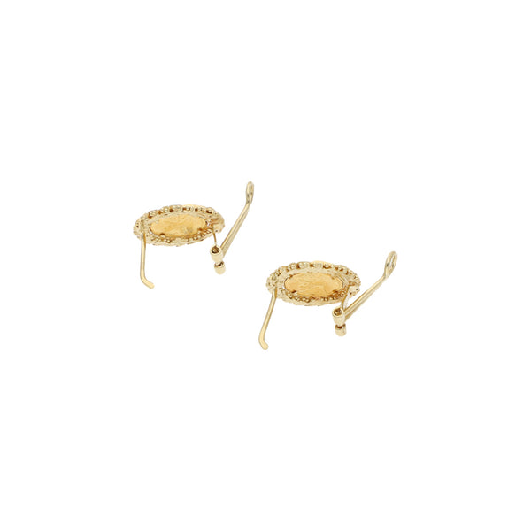 Aretes boleados calados en oro amarillo 14 kilates.