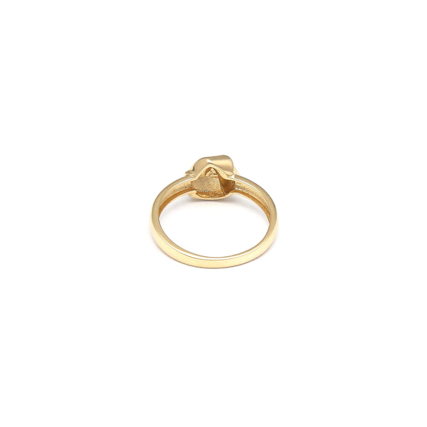 Anillo liso motivo nudo en oro amarillo 14 kilates.