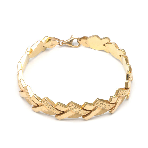 Pulsera eslabón articulado en oro amarillo 14 kilates.