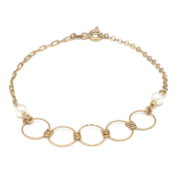 Pulsera eslabón combinado con perlas en oro amarillo 14 kilates.